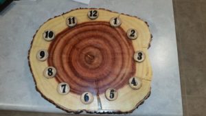 log slice, log slice clock, high gloss finish. custom clock