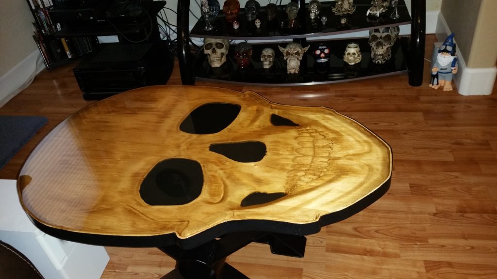 3D skull table, skull coffee table, carved skull coffee table, carved coffee table, handcrafted coffee table, custom coffee table, custom handcrafted coffee table, skull sculpture table
