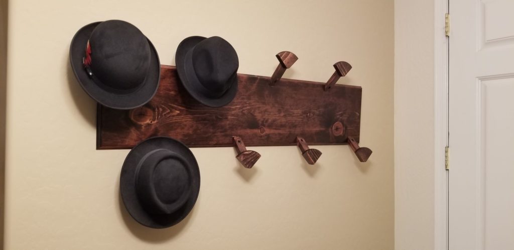 custom woodwork, custom designed hat rack, custom wood designs, wall decor, wall hanging, cowboy hat rack